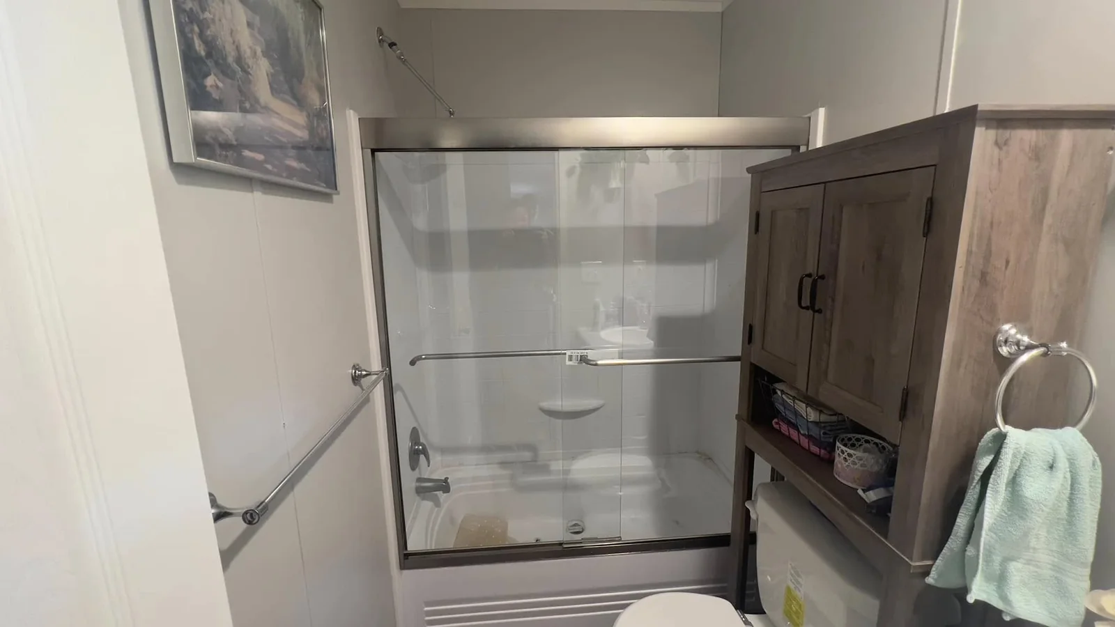 Bathroom improvement with glass enclosure