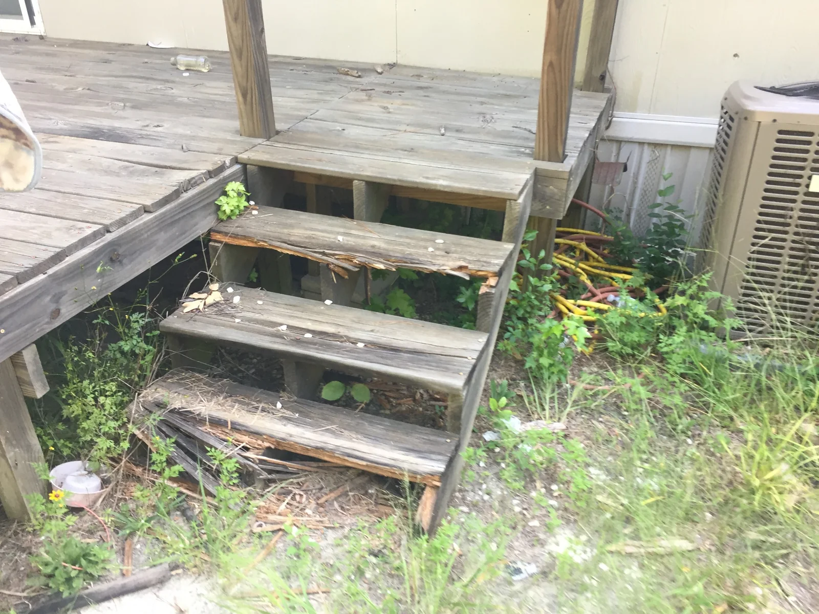 Damaged exterior steps before repair